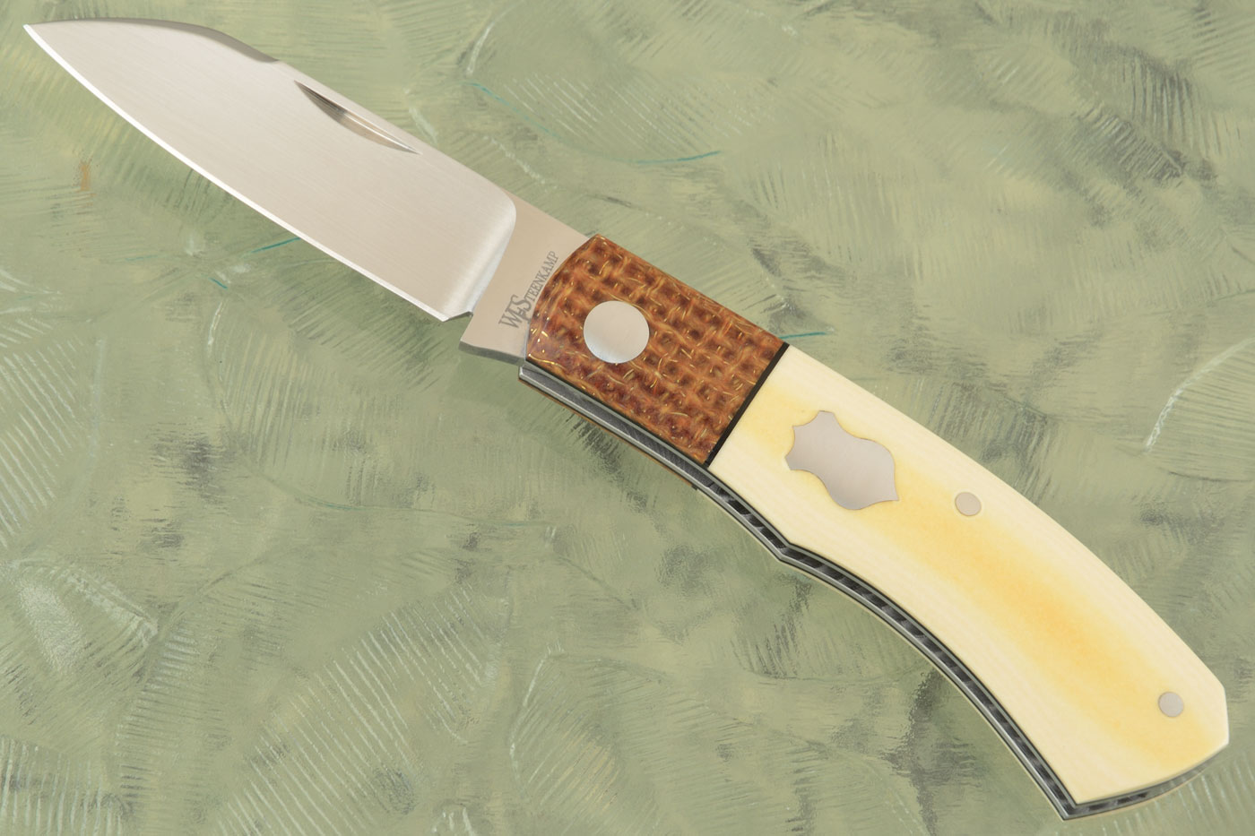 Dino Slipjoint with Antique Westinghouse Micarta and Thunderstorm Kevlar