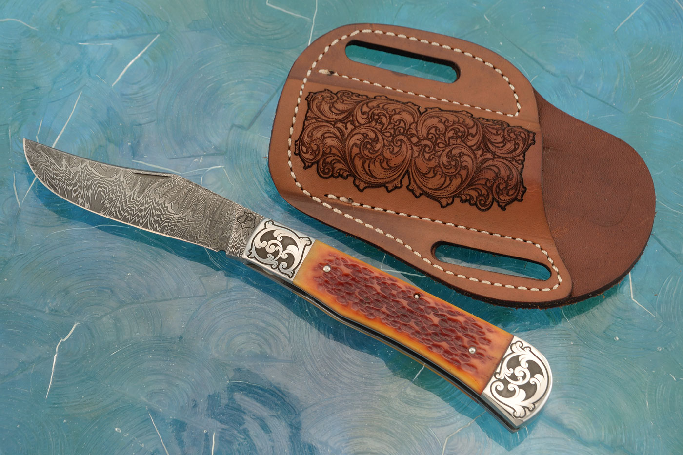 Damascus Slipjoint Trapper with Amber Jigged Bone