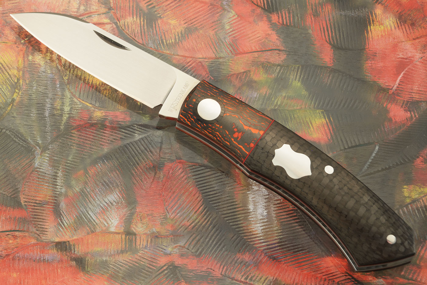 Dino Slipjoint with Carbon Fiber and Lava Flow FatCarbon - M390