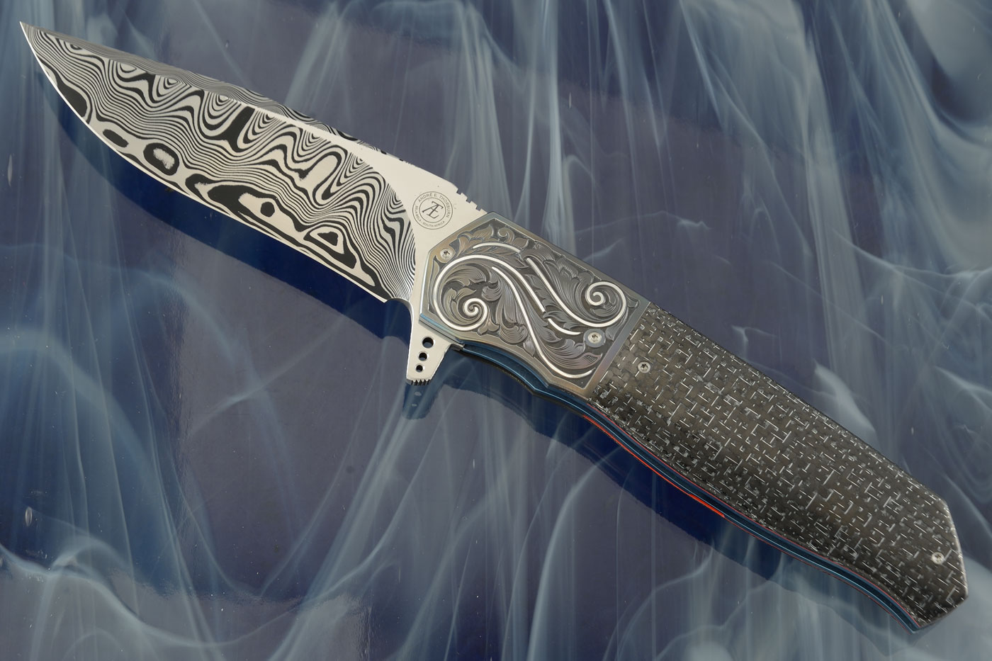 L36M Flipper with Silver Strike Carbon Fiber, Zirconium, and Damasteel - Engraved Scrolls and Silver Inlay (Ceramic IKBS)
