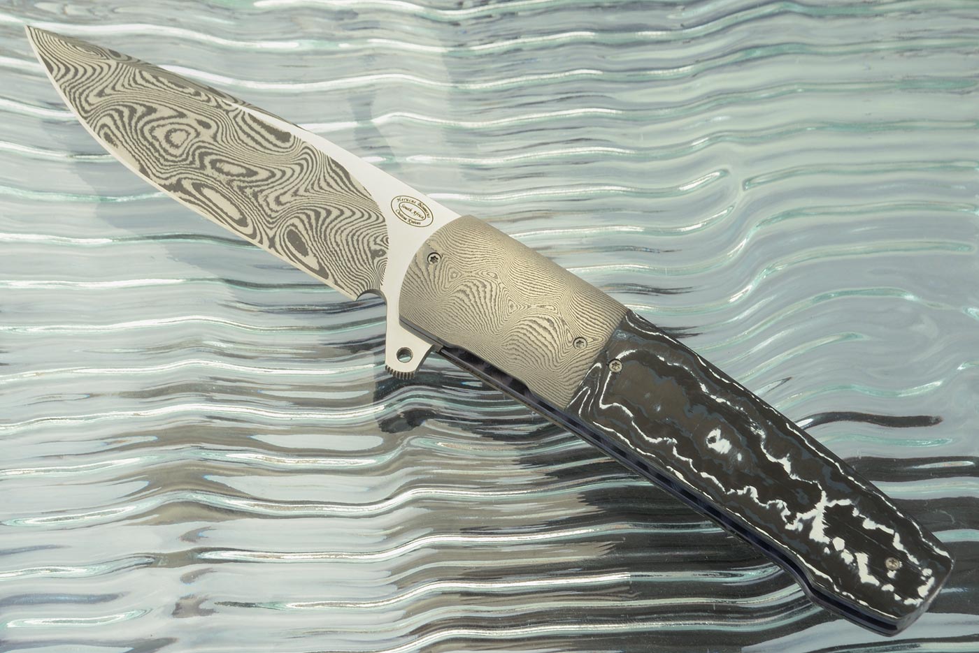 LL07 Flipper with White Storm FatCarbon and Damascus (Ceramic IKBS)