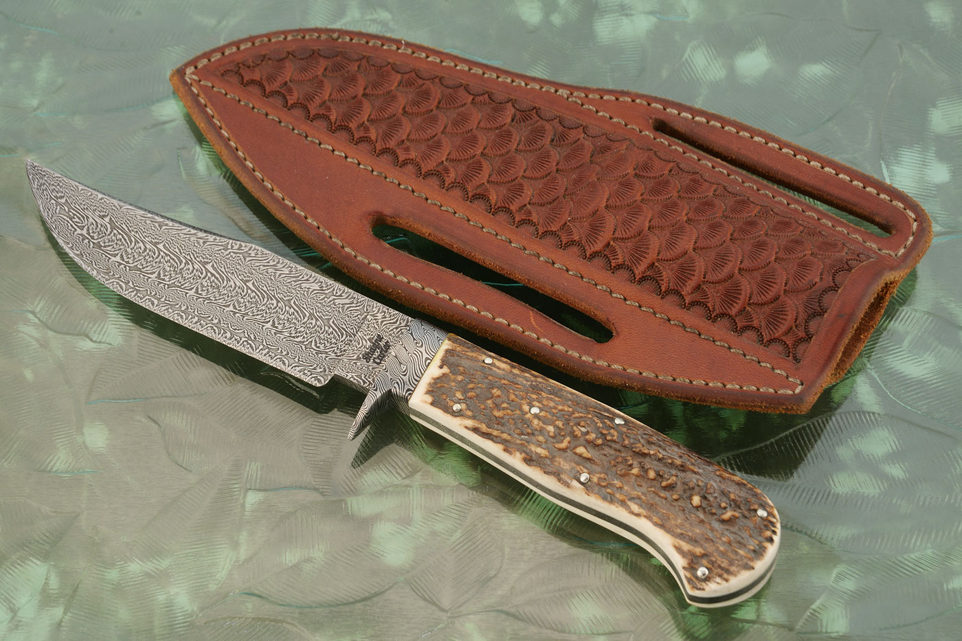 Frame Handle Damascus Clip Point Hunter with Stag