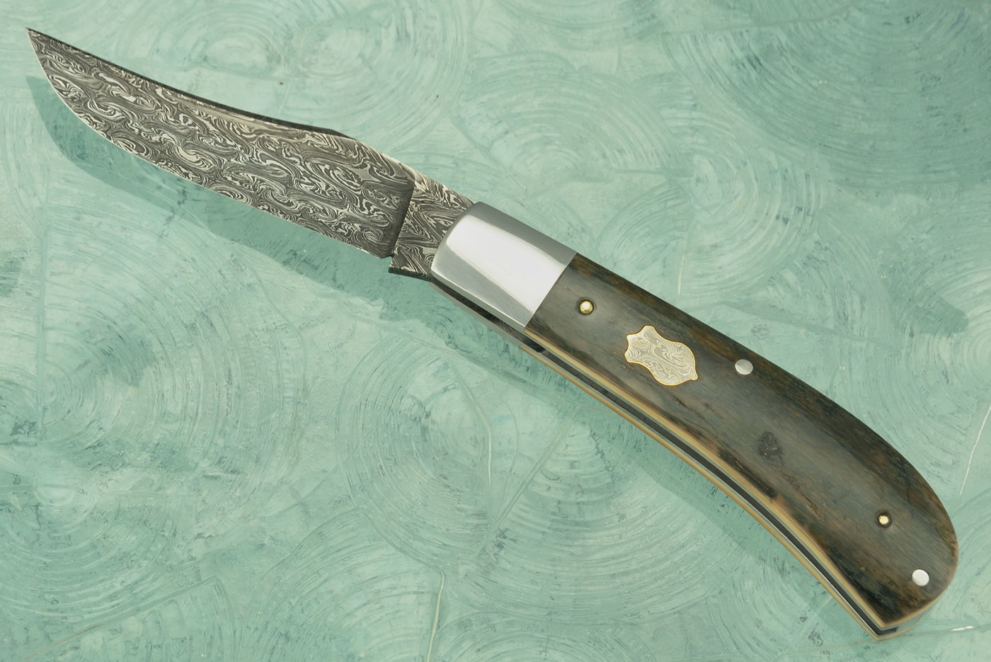 Damascus Slipjoint with Green Mammoth Ivory