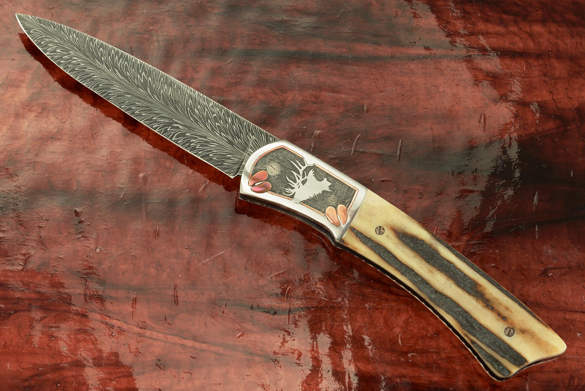 Engraved Front Flipper with Stag and Feather Damascus