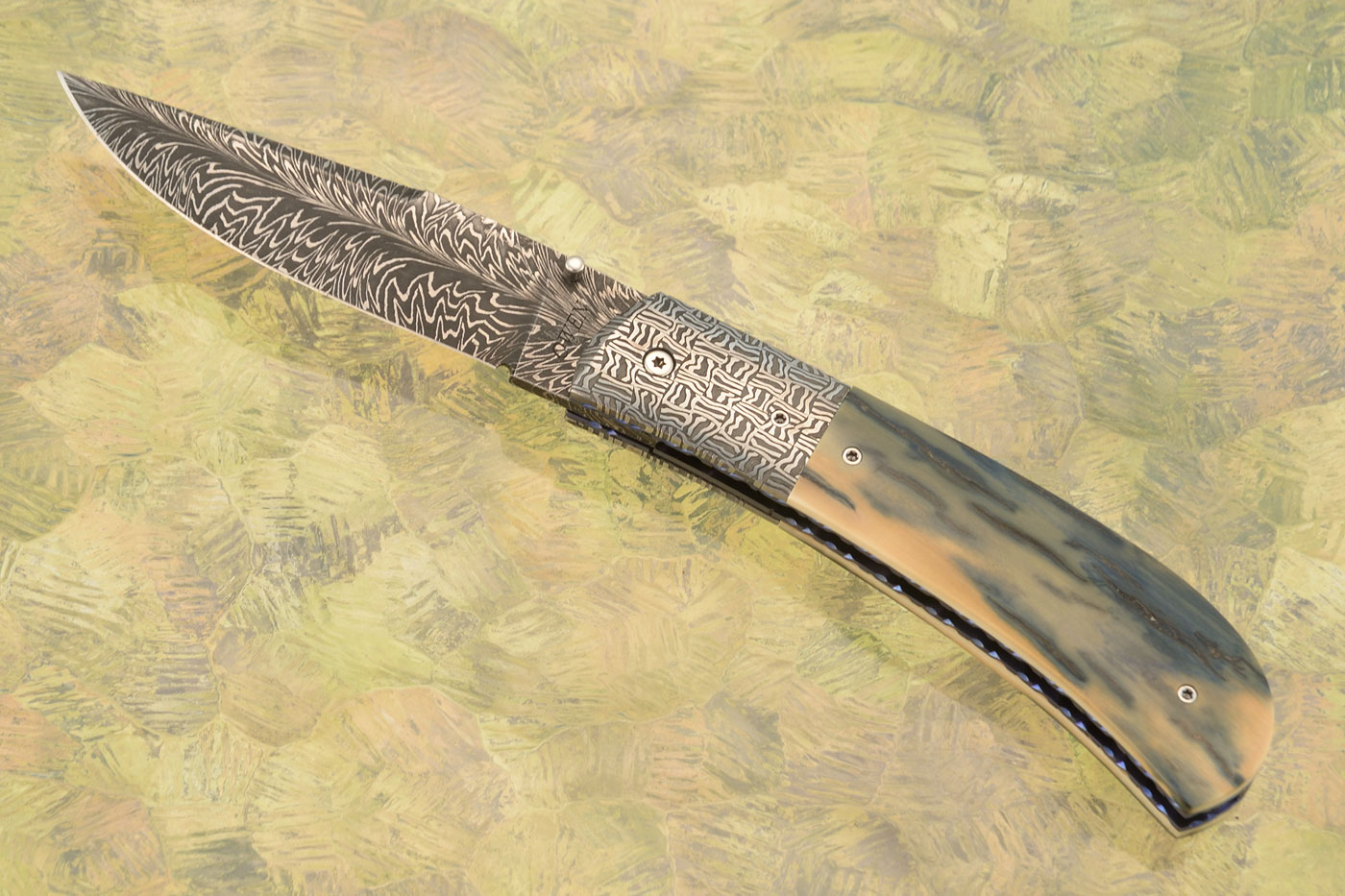 Mammoth Ivory and Feather Damascus Folder