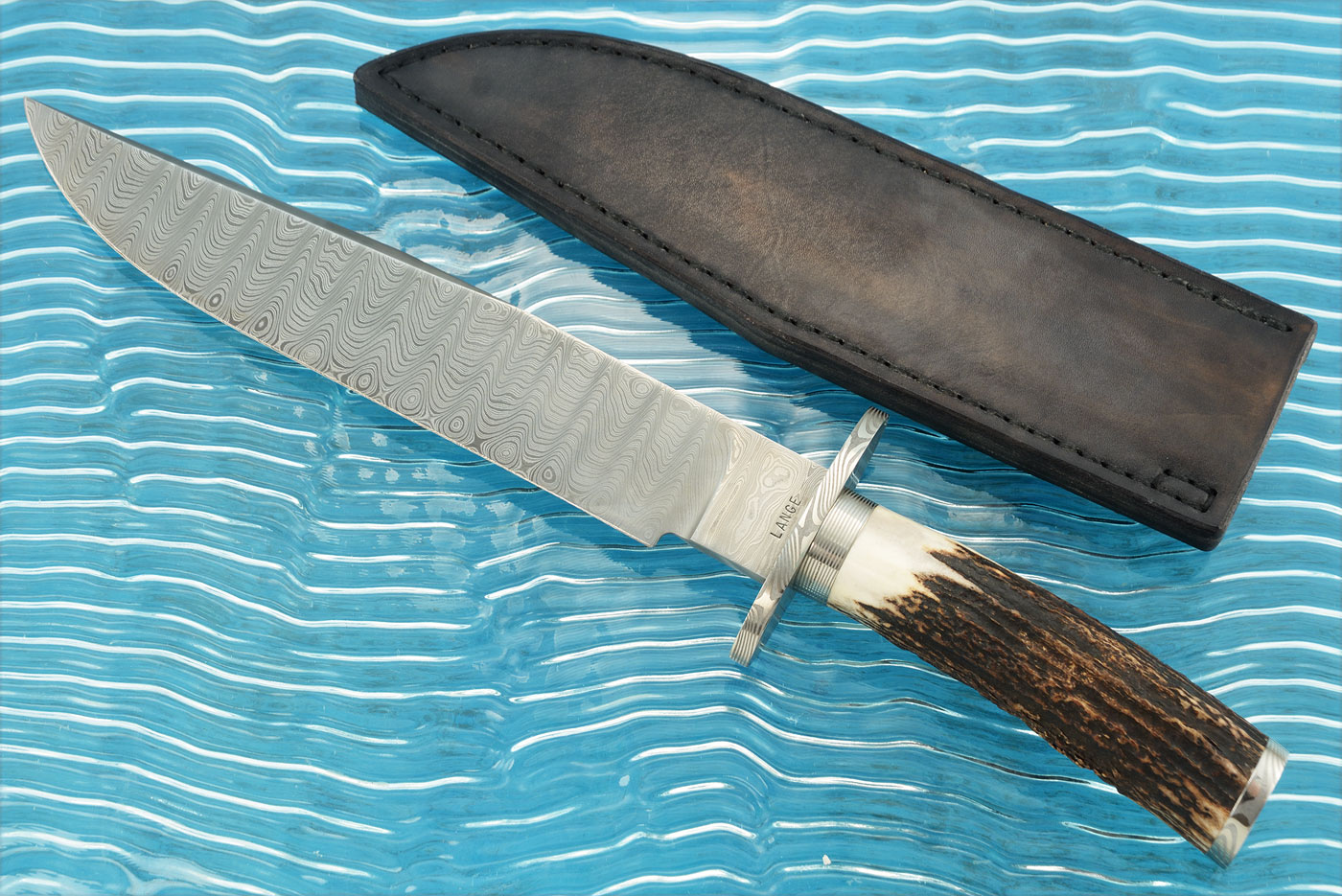 Ladder Pattern Damascus Bowie with Stag