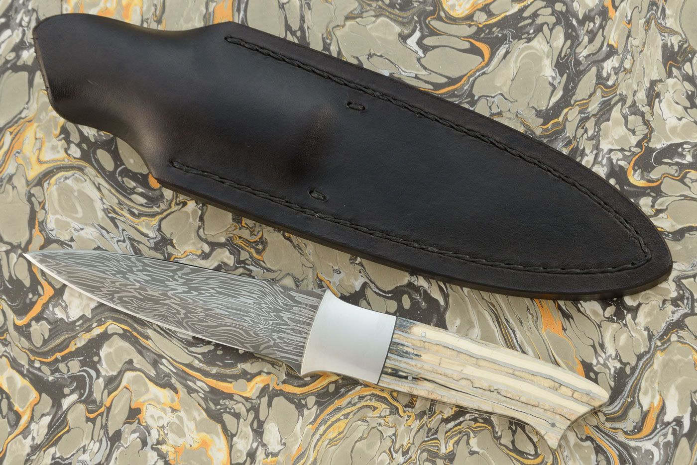 Damascus Boot Knife with Mammoth Molar