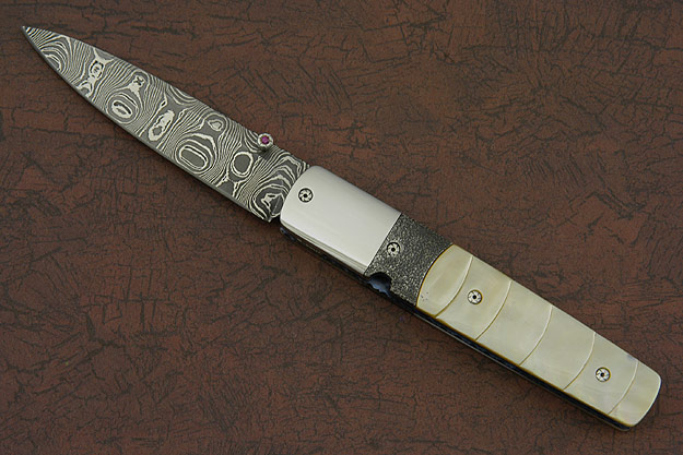 X-Claim with Sculpted Gold-Lip Mother of Pearl