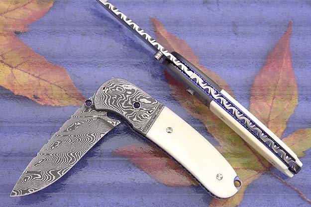 Damascus Folder with Warthog Ivory Scales