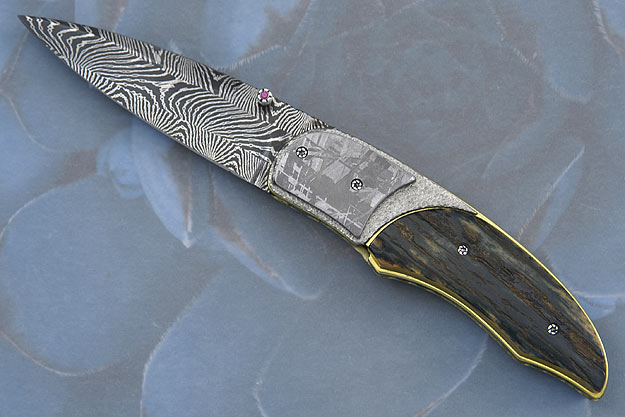 X-Cite with Meteorite and Mammoth