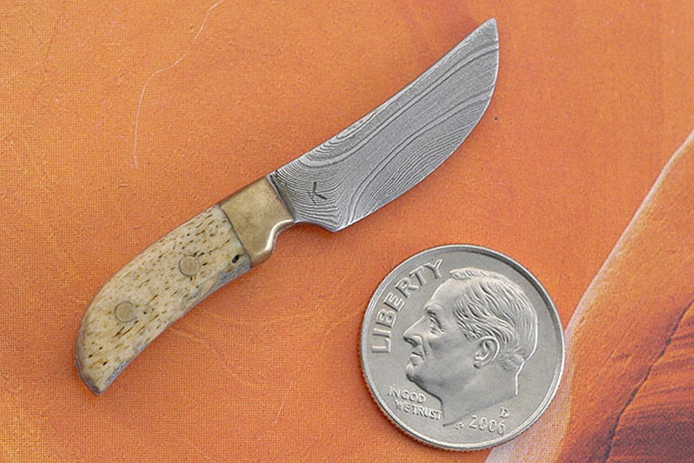 BladeGallery Fine handmade custom knives, art knives, swords, daggers