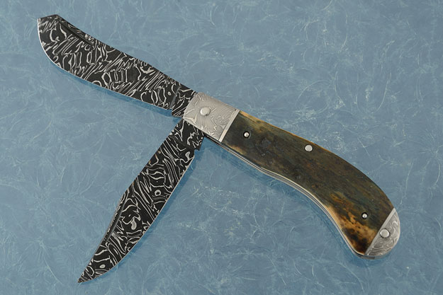 Damascus Two Blade Saddlehorn Trapper with Mammoth Ivory